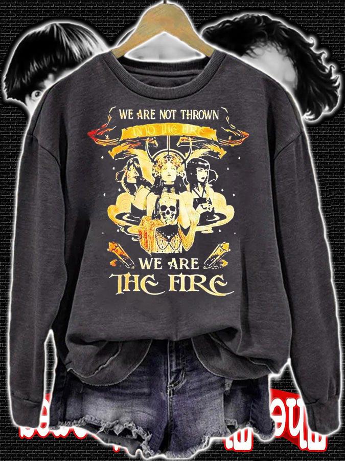 Witch we are not thrown into the fire we are the fire T-shirt
