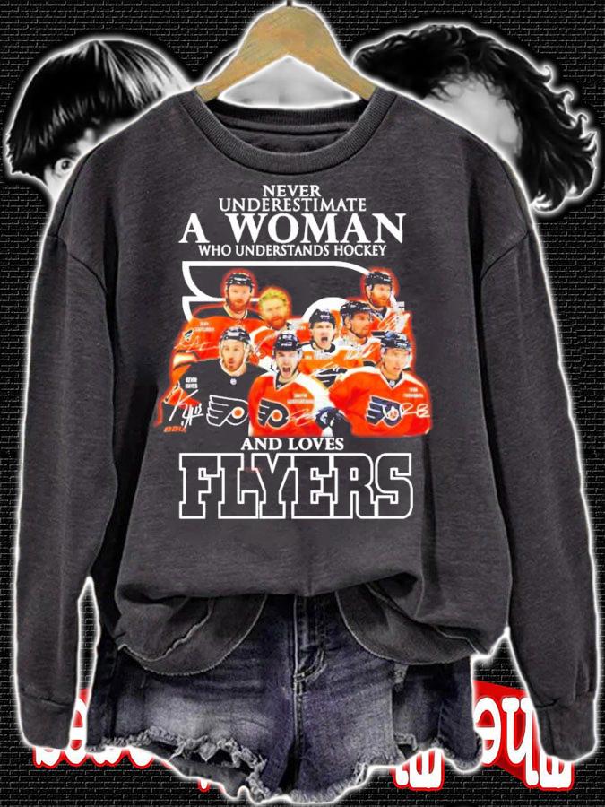 Never underestimate a woman who understands hockey and loves Flyers t-shirt sweatshirt